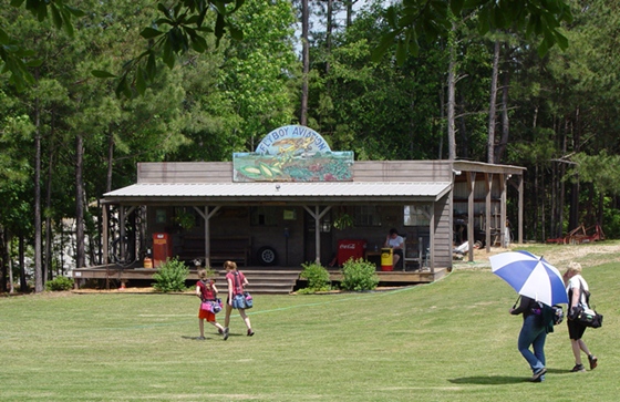 Players walking by General Store during doubles round.