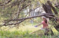Ann throws from inside a tree